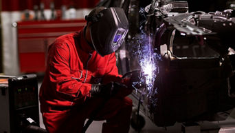 An Audi mechanic at work.