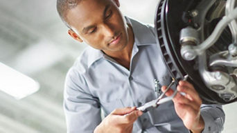 An Audi mechanic at work. 