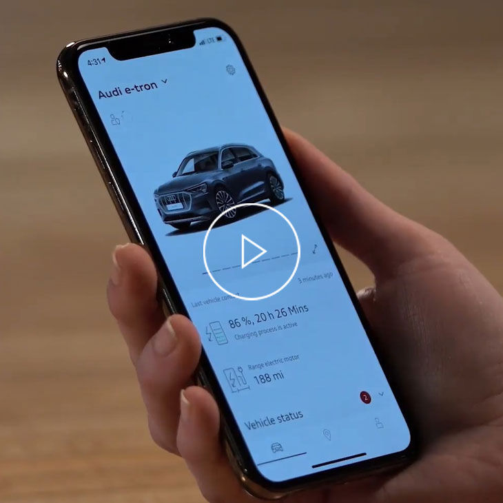  Close-up on a cell phone displaying the myAudi app. 