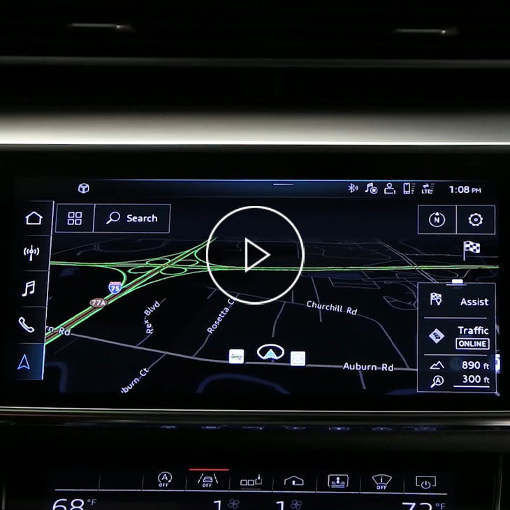  Close-up photo on the MMI screen in an Audi vehicle displaying the navigation feature.