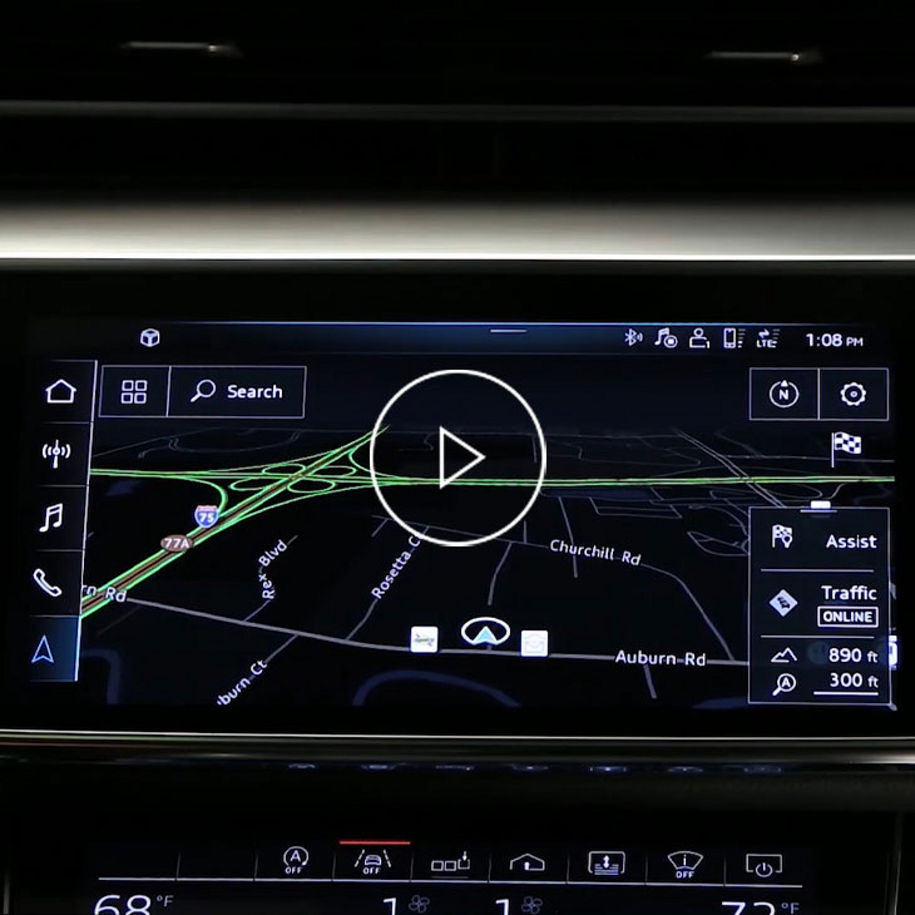 Close-up photo on the MMI screen in an Audi vehicle displaying the navigation feature.