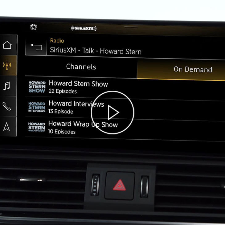  Close-up photo on the MMI screen displaying SiriusXM shows.