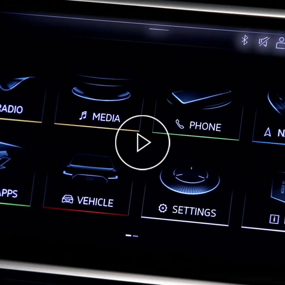Close-up photo of the MMI screen in an Audi vehicle. 
