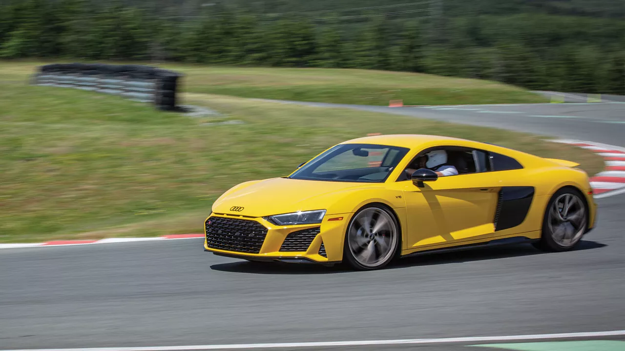 Yellow R8 driving on the Vancouver Island Motorsport Circuit track