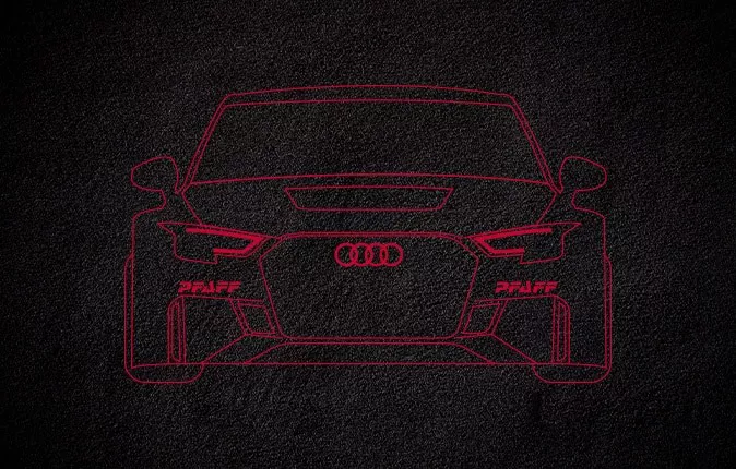 Left profile view of an Audi q8 vehicle parked.