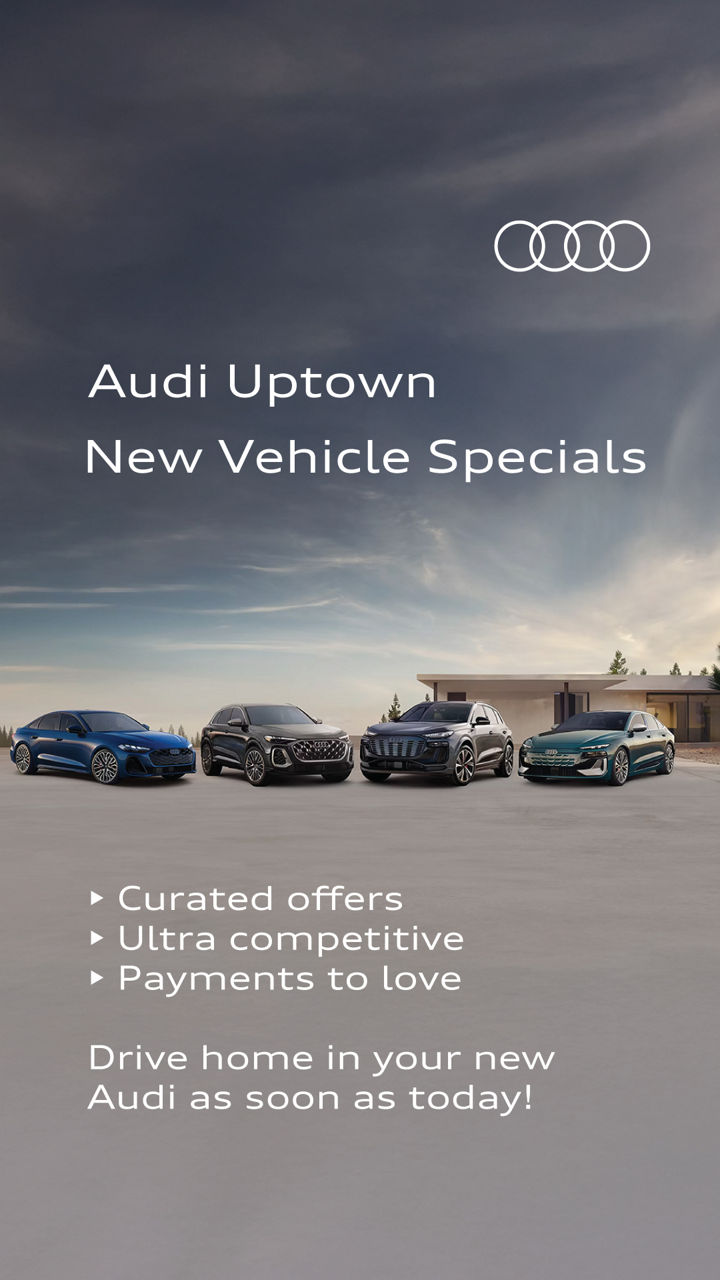 Three quarter view of an Audi A4 parked.