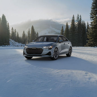 Audi A3 equipped with winter tires parked on a snow-covered road