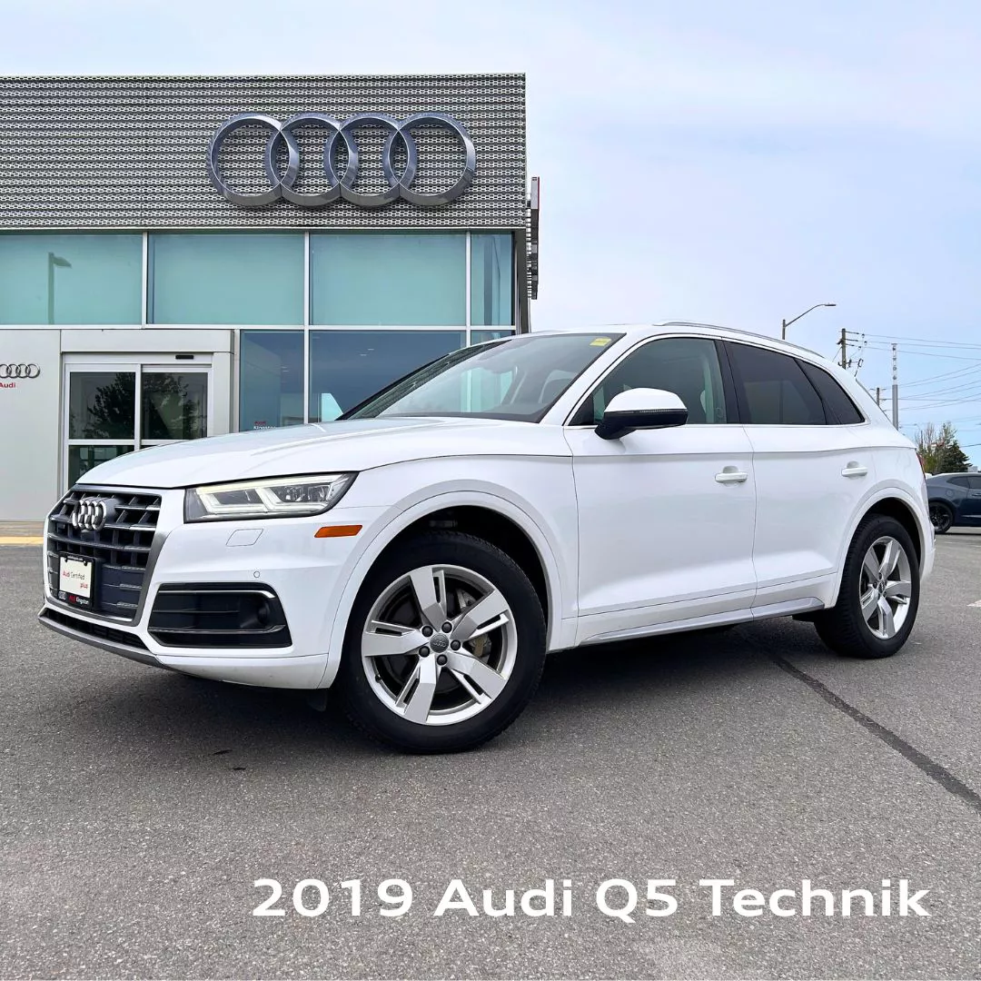 image of a 2019 Audi Q5 in front of an Audi dealership
