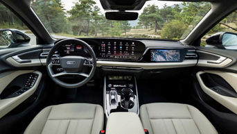 Interior of a 2025 Audi A5 model from the front seat view.