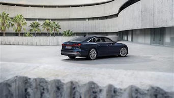 Three-quarter back view of the 2026 Audi A6 Sedan.