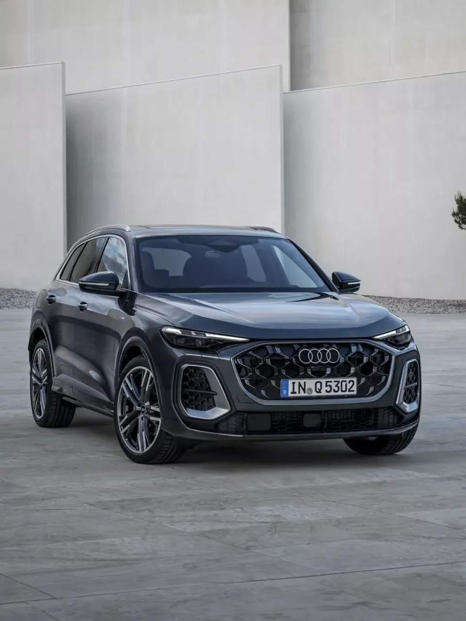 Profile view of Audi vehicle. 