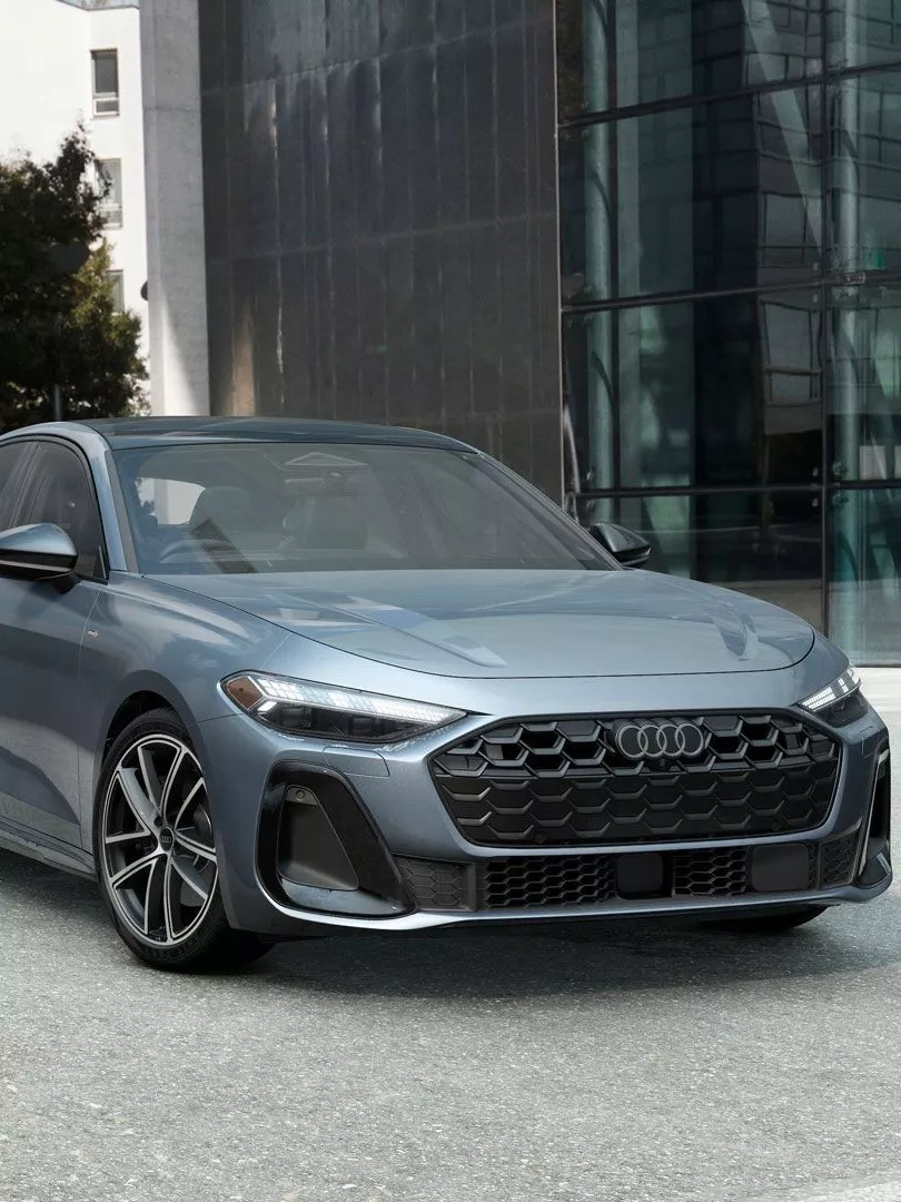 Front profile view of an Audi parked.