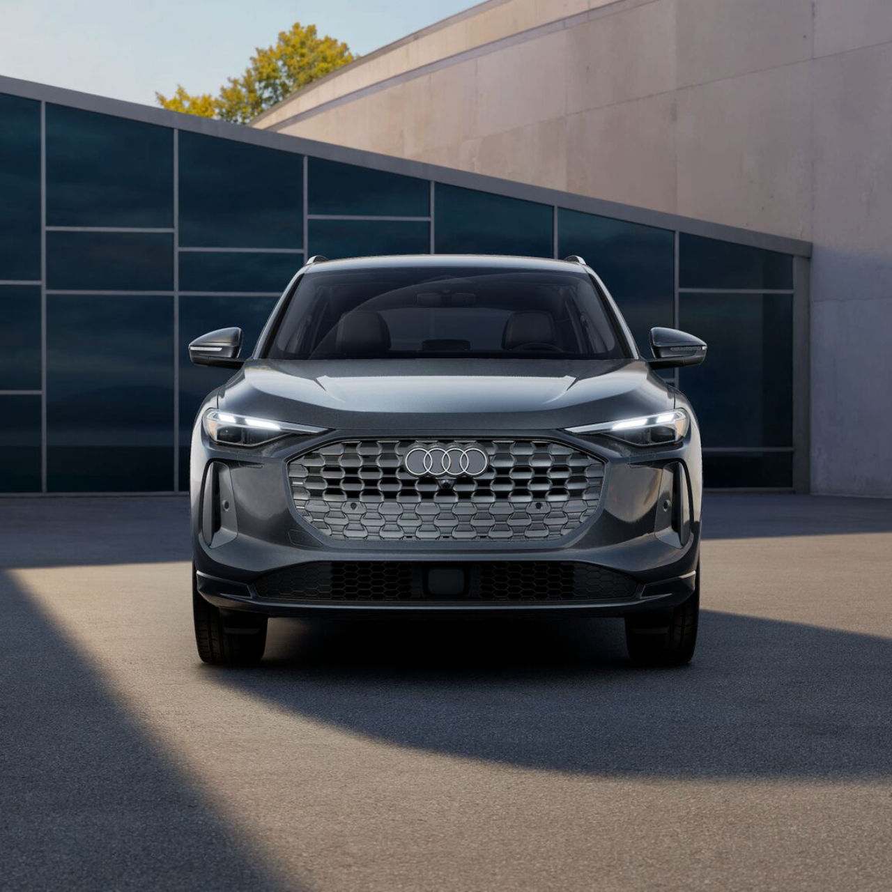 Rear profile view of an Audi Q5 parked.