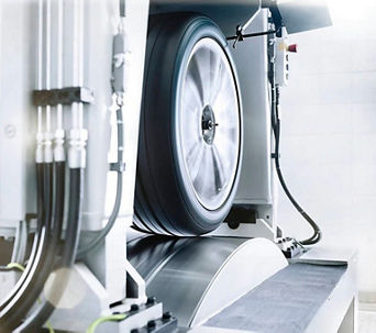 Wheel being aligned on vehicle