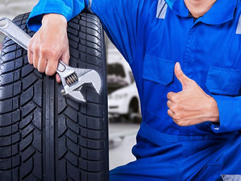 Technician holding Allen key.