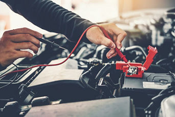 Vehicle battery being serviced. 