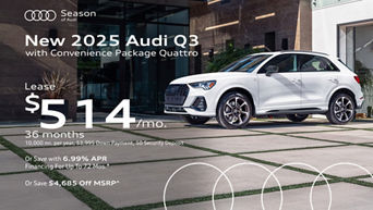 Side view of an Audi Q3 parked.