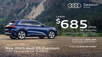 Side view of an Audi Q5 parked.