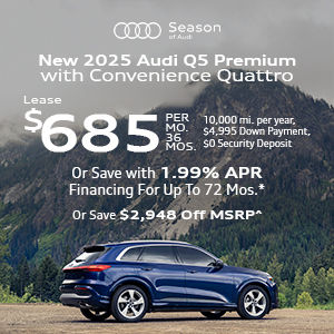 Side view on an Audi Q5 parked.