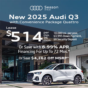 Side view of an Audi Q3 driving.