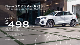 Side view of an Audi Q3 parked.