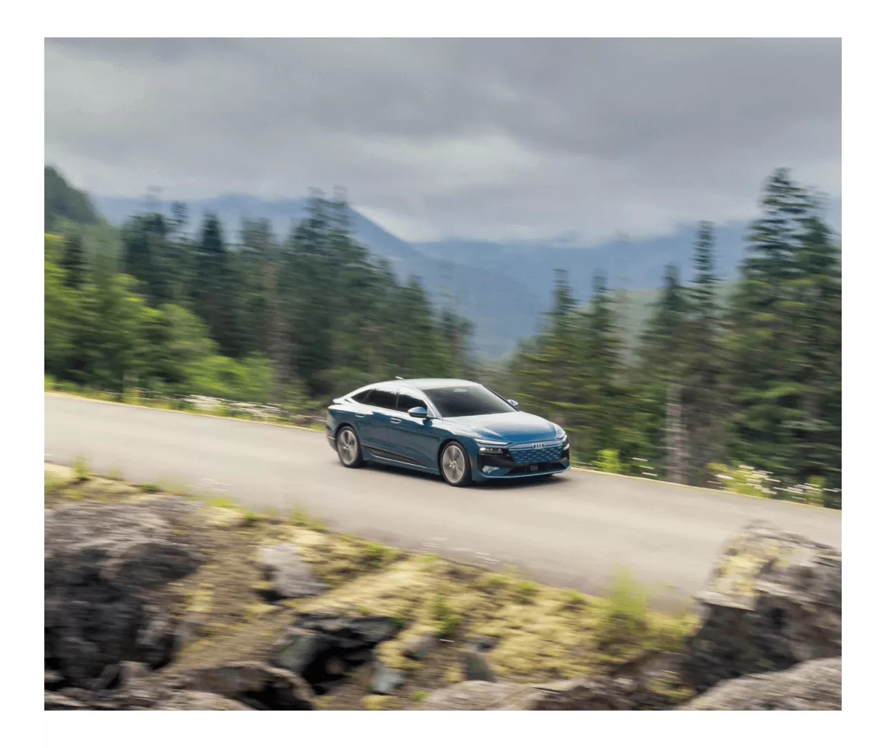 2025 Audi A6 Sportback e-tron driving through the forest