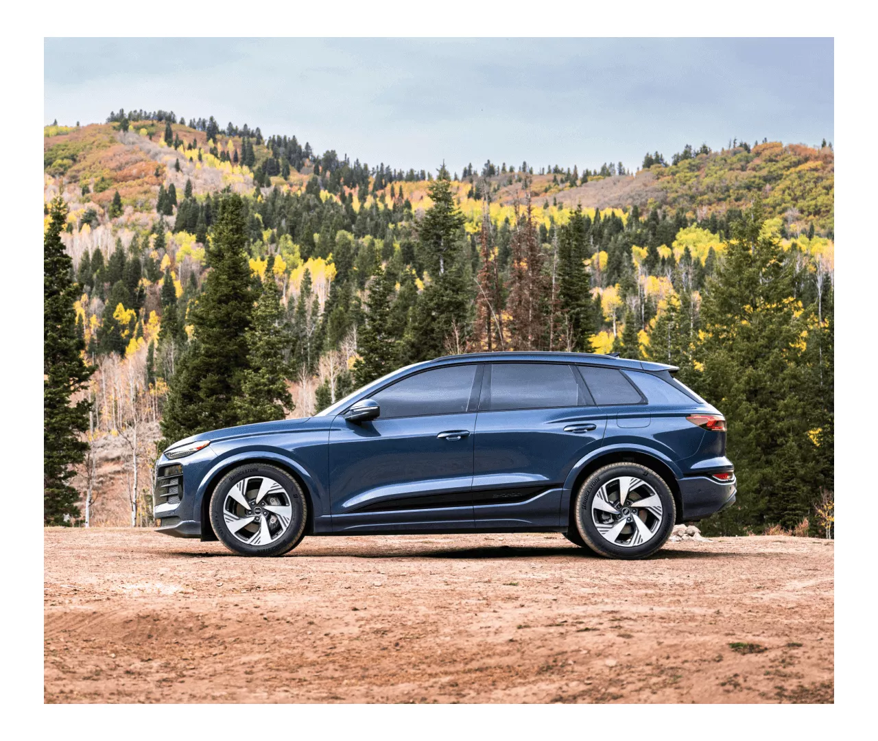 2025 Audi Q6 e-tron parked in the wilderness of Upstate New York during the summer