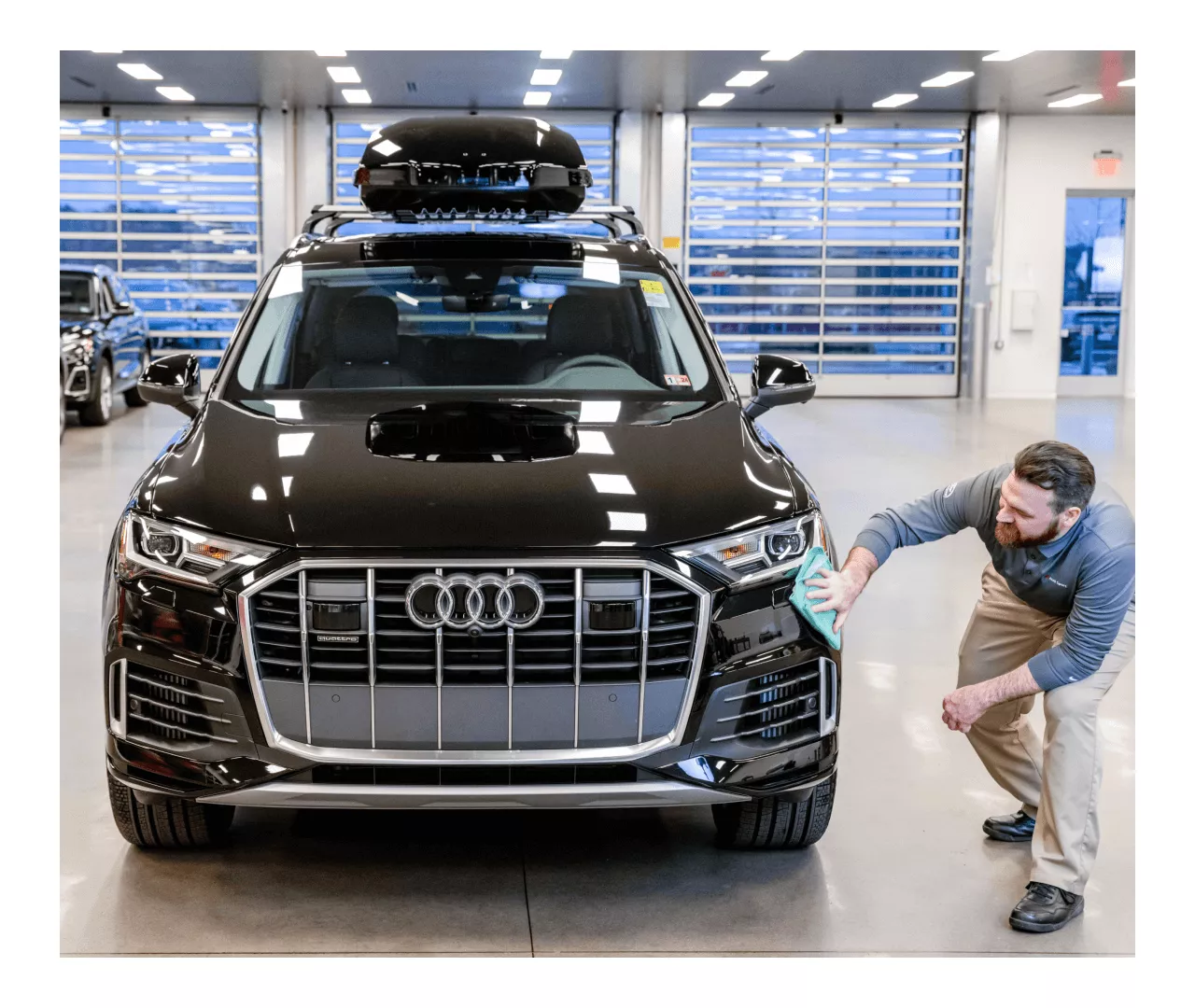 New Audi being polished in a new Audi showroom