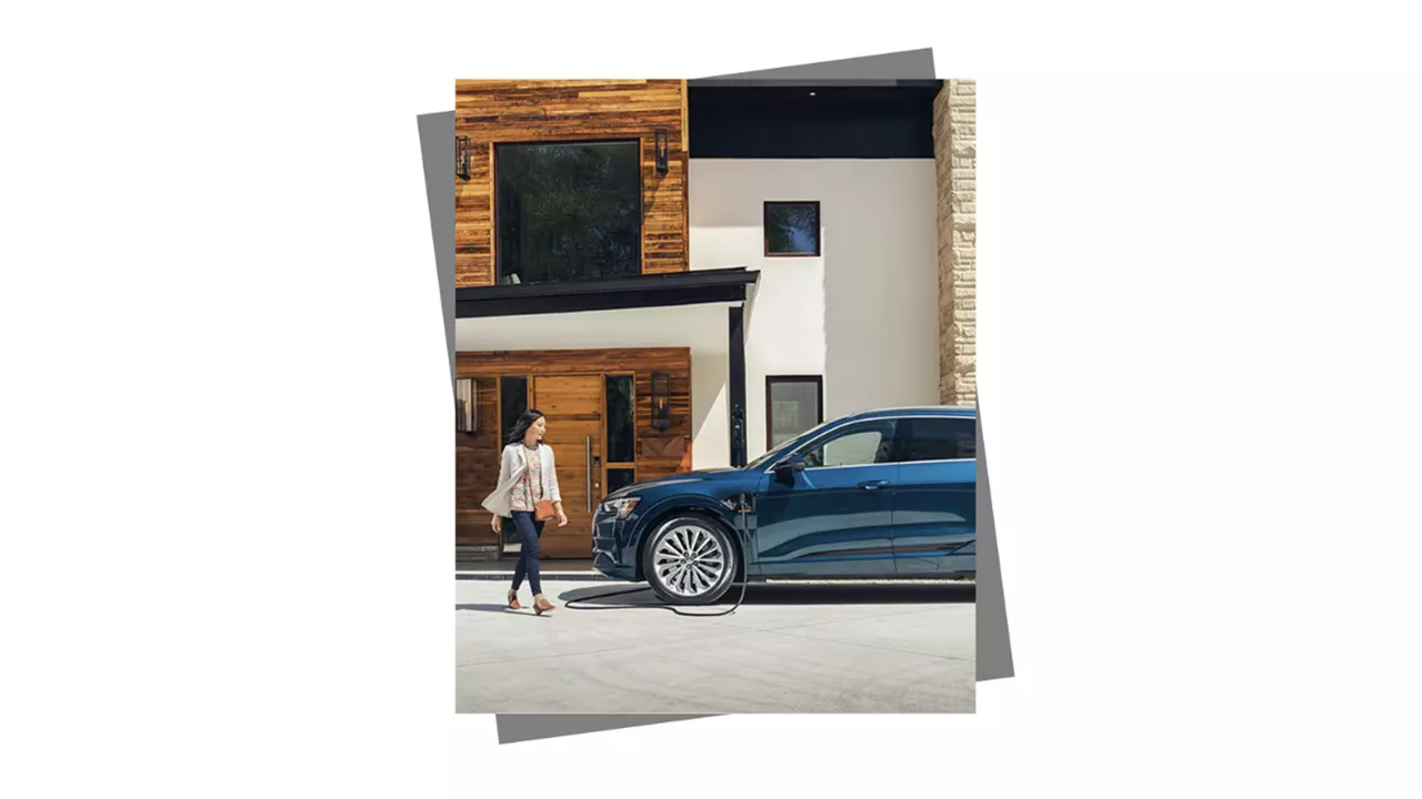 Blue Audi SUV parked.