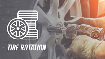 Service technician serving vehicle.