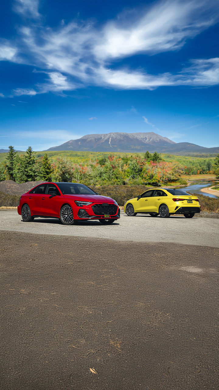 Audi Q5 driving through mountain road in Maine