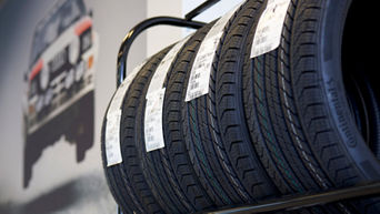 Image of a set of tires on a rack.