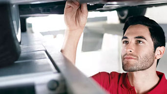 Audi Service specialist working.
