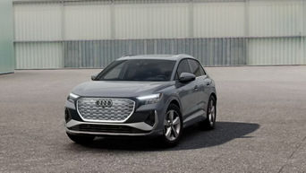 Front facing view of an Audi Q4 parked.