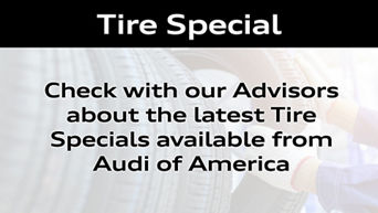 Service technician servicing tires. 