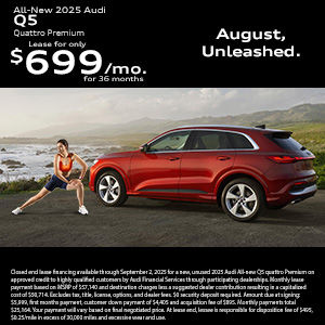 Side view of an Audi Q5 parked.