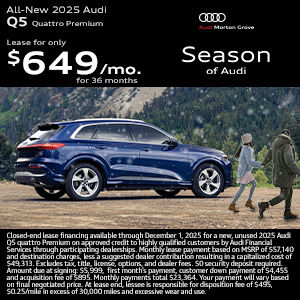 Side view of an Audi Q5 parked.