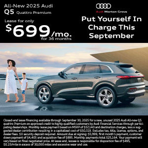Side view of an Audi Q5 parked.