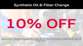 Service technician serving vehicle.