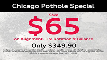 Service technician servicing vehicle. 