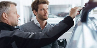 Service technician checking the car