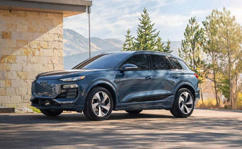 Side profile view of an Audi Q6 e-tron. 