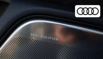 Audi interior showcasing Bang & Olufsen premium sound system speakers