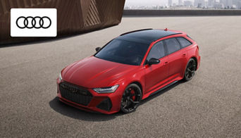 Sleek Audi coupe parked outside Audi Dayton dealership showcasing sporty design and luxury features