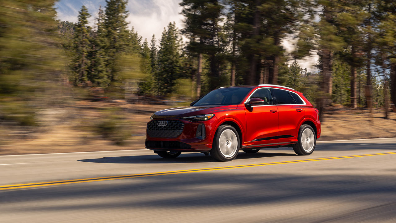 Side view an Audi Q5 accelerating.