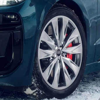 Service technician serving vehicle.