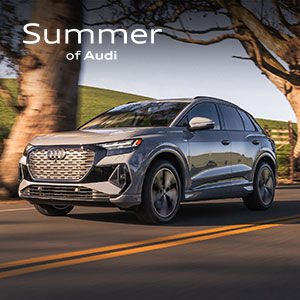 Side view of an Audi Q4 e-tron parked.