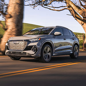 Side view of an Audi Q4 e-tron parked.