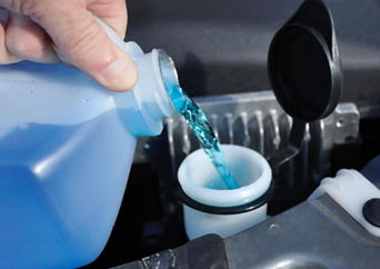 Car fluids being changed. 