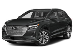 Side view of an Audi Q4 parked.
